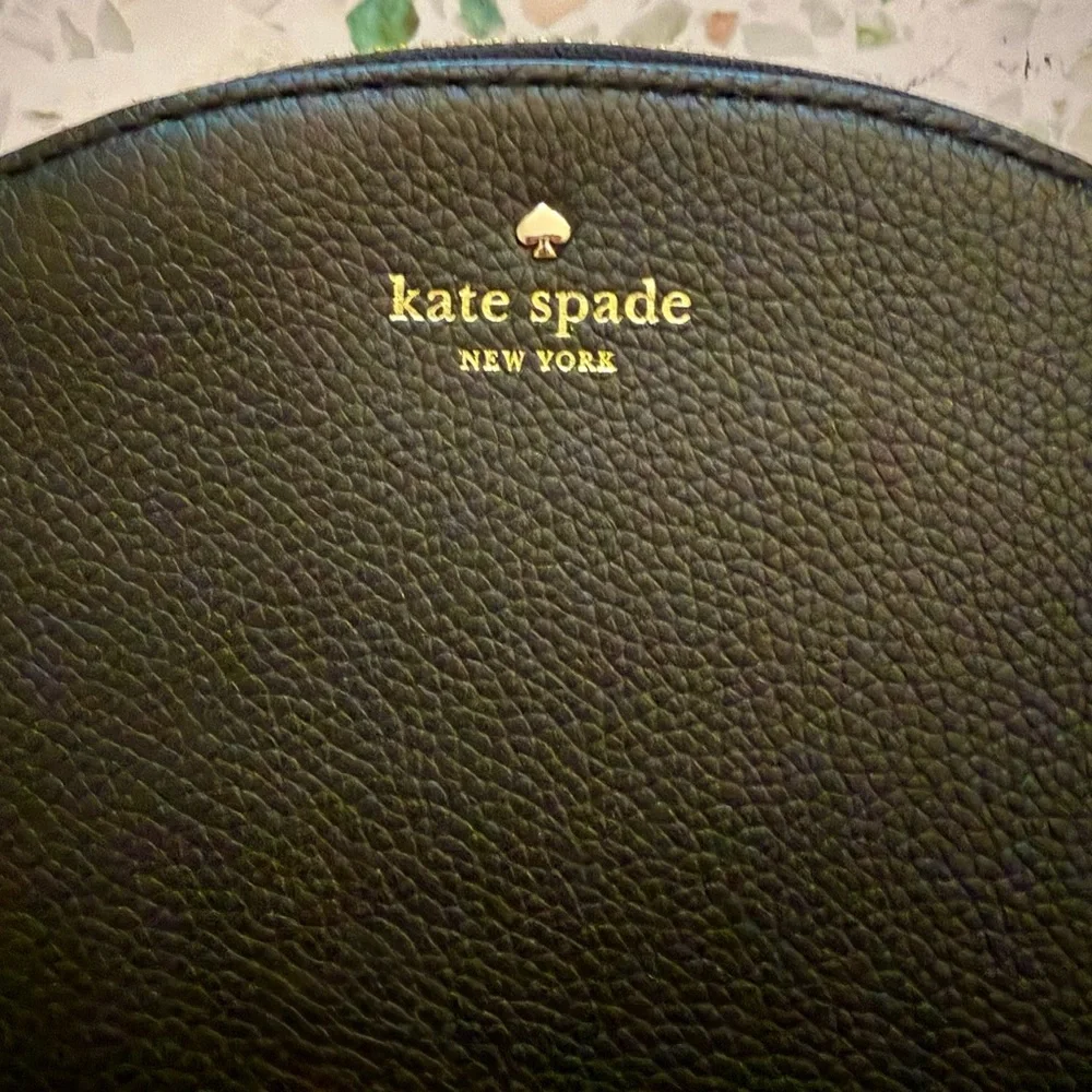 Brand new kate spade black pebble leather wristlet clutch with gold logo